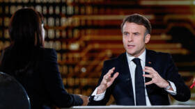 French President Emmanuel Macron answers questions of journalists during a televised interview broadcasted on TV channel France 2.
